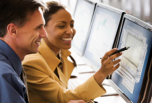 Women pointing at computer